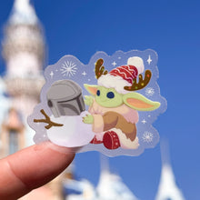 Load image into Gallery viewer, Baby Alien and Mando Snowman Holiday Reindeer Hat Transparent Sticker