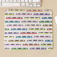 Load image into Gallery viewer, Colorful monorail train pattern mouse pad on a desk with a keyboard and mouse.