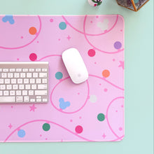 Load image into Gallery viewer, Pink mouse pad with colorful patterns on a light blue surface, featuring a keyboard and mouse.