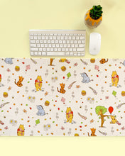 Load image into Gallery viewer, Desk setup with a Winnie the Pooh-themed mouse pad, keyboard, and mouse on a yellow background.