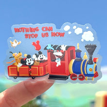 Load image into Gallery viewer, Colorful train sticker with cartoon characters and &#39;Nothing can stop us now&#39; text held against a blurred outdoor background.
